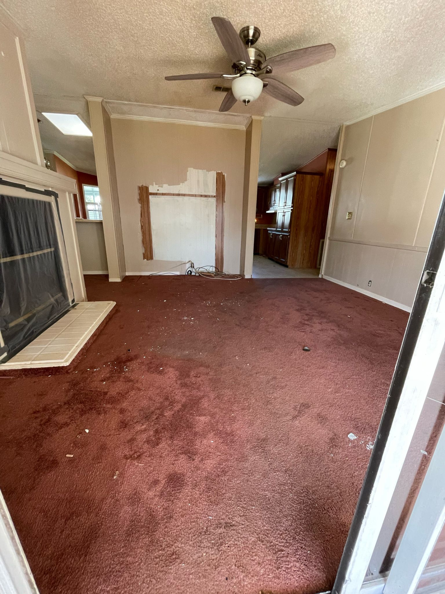 Flooring Installations before — Living room plank flooring